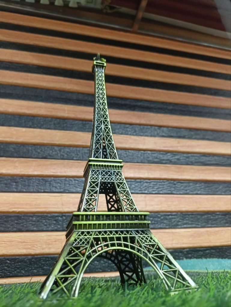 bronze-tone metal Eiffel Tower